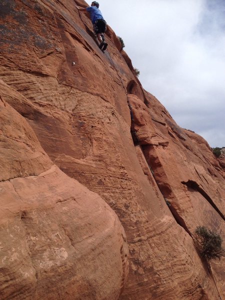 Amputee lead. Crux of climb.