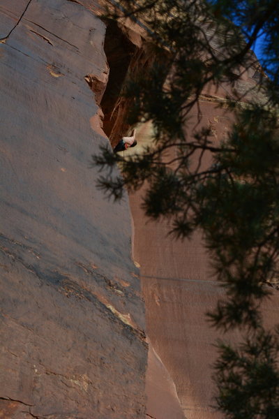 Unknown climber moving through the overhanging section