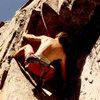 Back in the day, ~1989, 90 Foot Wall, Lightning Bolt 5.10b -- getting ready to go over.....