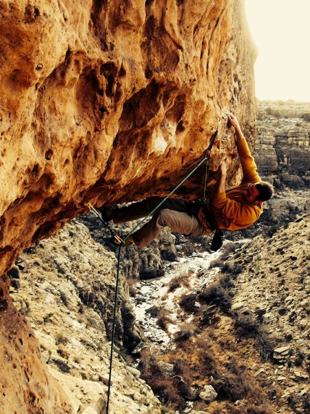 Dan on the 2nd ascent of Big Mouth. The Bigmouth Wall is down canyon from the Main Wall.