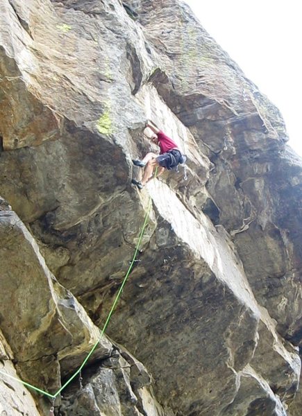 Sustained, delicate headwall climbing just above the crux lip pull.