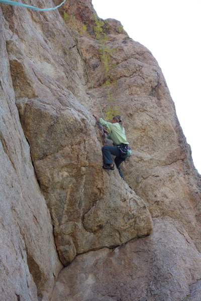 Dede pulling jugs on the roof of Trout Mask Replica, The Nose.  Note the rope hanging in the upper left corner to get a perspective on the steepness.