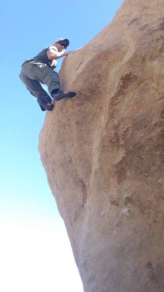 This is a really fun boulder problem right on the road in the Tombstone area. Probably a v3-4.