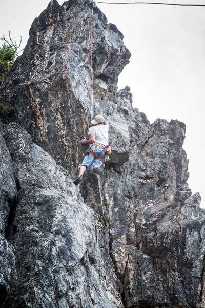 Ben stepping onto the arete on Size 11 and Size 12