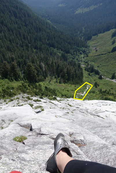 From belay station of first pitch. Rocky area highlighted shows the part of the approach after coming out of the brushy tunnel.