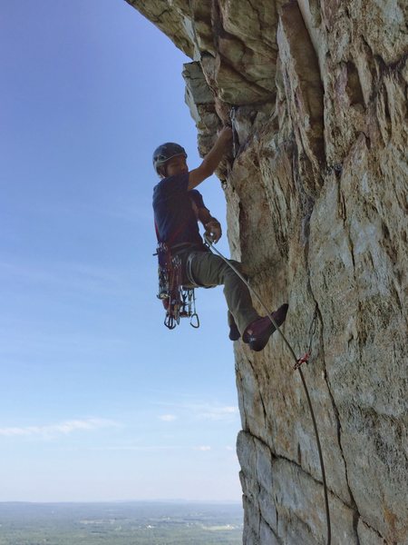 Tom, more or less finished with the traverse and about to clip one of the old fixed pins