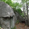Another cluster. The Crackhouse boulder on left, Pompadour boulder on right.