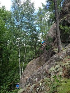 Michelle leads Slabbatical with Dustin on belay.