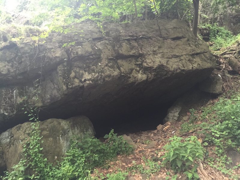 Caveman Boulder at the base of the walls. Located right of the trail by the Castle parking lot.