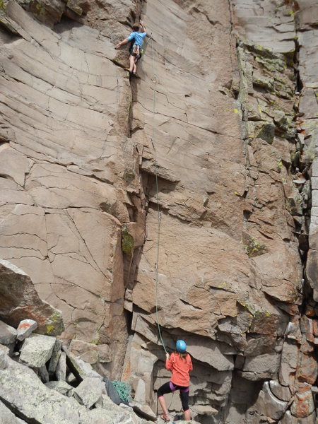 Scott on lead and Lili on belay