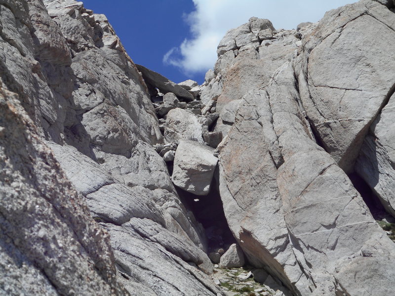 The chockstone in the third chute. Nearly snow free in late July, 2015.