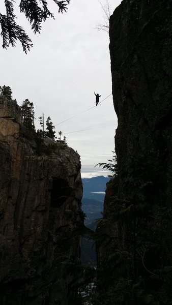 Slack lining high above the north gully, near the summit of the Chief.