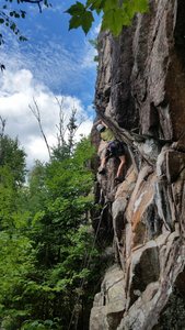 Mike working his way onto the slab ledge