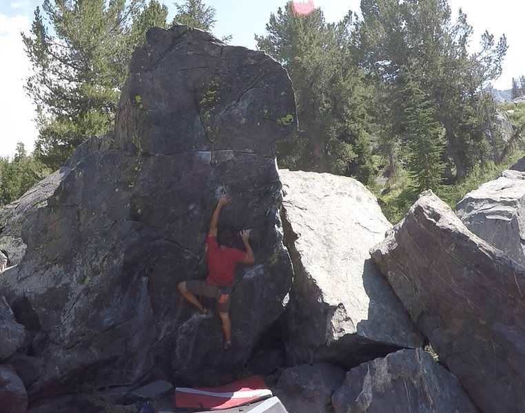 Moving up through Black Face Direct using the unique holds on the face.