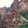 The Crying Dinosaur is a great multipitch adventure overlooking the Siphon Draw trailhead. The route is accessed around the south side of the pinnacle<br>
Photo Courtesy of ClimbPHX.com