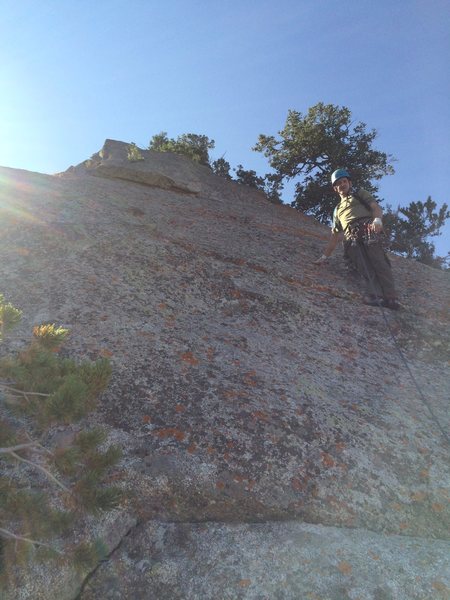 The 7th pitch 5.7R slab, from there the climber goes left to the arete and stays on it, or wusses out and goes right.