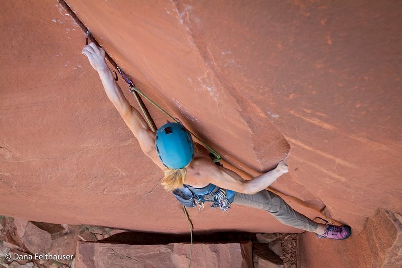Photo by Dana Felthauser. Placing a black alien before the crux.