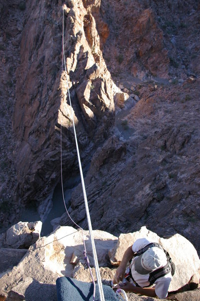 Looking across the canyon from the top of the tyrolean. George Smith on deck.