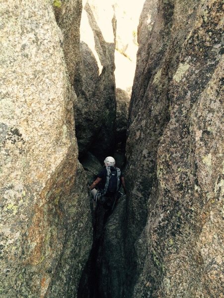 Climb down this slot to get from the top of Pin Route to the descent down Bowels of the Owls.