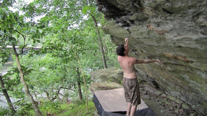 Climber at the far left end of the WV Wall. He is scoping Mountain Mama