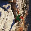 Josh Beckner topping out the Lowe Route on the Question Mark Wall.