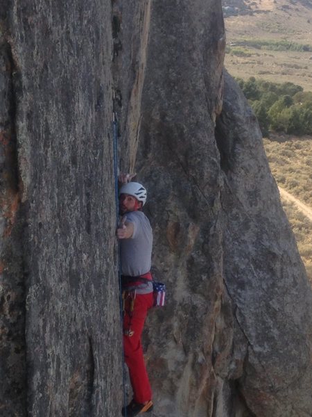Ian Cavanaugh styling a balancy no hands rest at the second bolt before cruising the upper half.