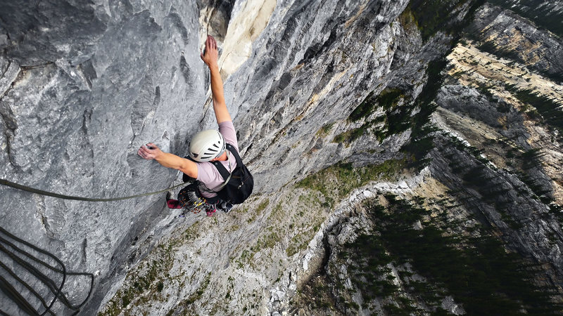 Finishing the 4th pitch (5.11b) on Tall Storey