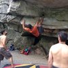 Me attempting the Andrew Boulder Problem. Shortly after this picture was taken I fell square on my back trying to pull through the crux