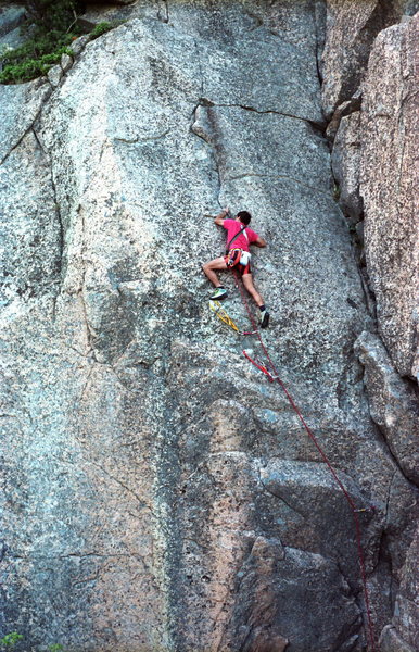 Chicken of the Sea 5.8 / Precipice Cliff / Acadia National Park / Climber: unknown / what's happening: Just passing the crux and working a beautiful flake up a clean slab