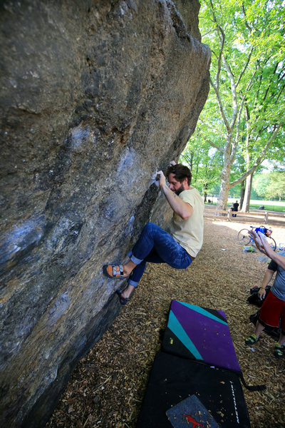 Setting up for the crux move on Rat Patrol V4 / Rat Rock / Climber unknown