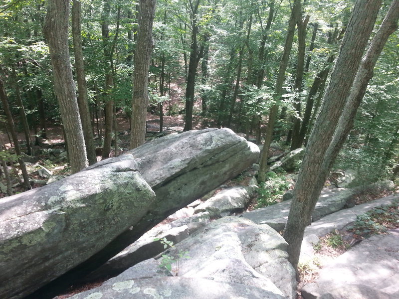Large and obvious prow shaped boulder on the top of the talus area.