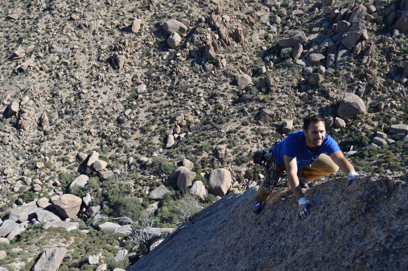 Kyle on the easy upper arete that leads to the chains