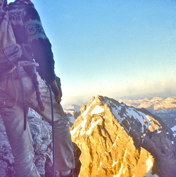 Keith Leaman on Wall Street, leading a group of 6 Perry-Mansfield climbers on Upper Exum Rt. 1968.