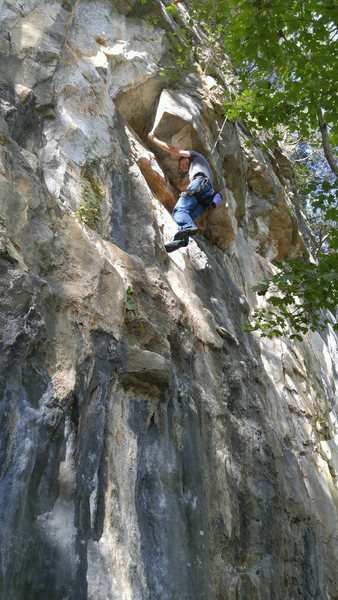 Working the moves on top rope. Getting close the crux.