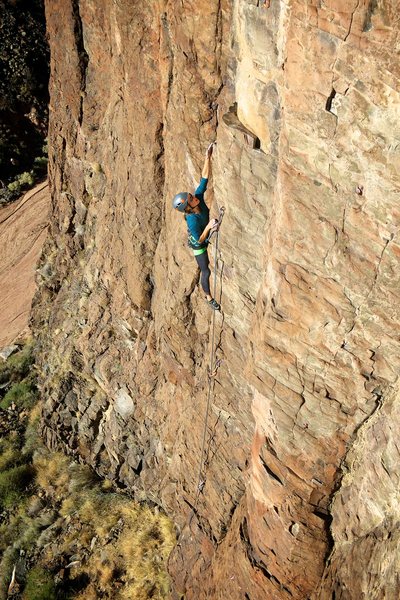 Long and consistent climbing on a faint arête makes for some engaging climbing. Cara makes a long move to yet another incut hold. November 2015.