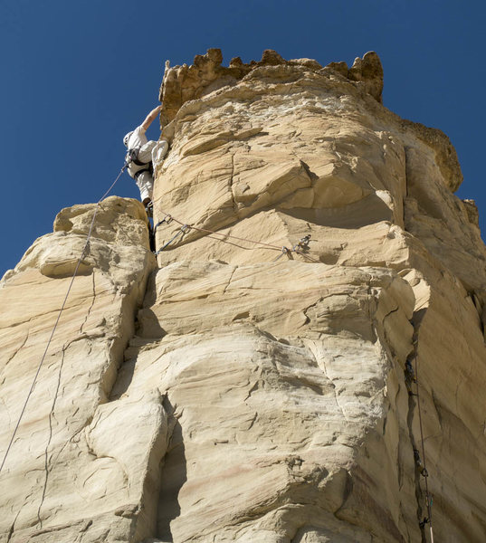Why is my belayer standing underneath me as I crank on the spooky, brittle projecting caprock? Oh well, the caprock turned out to be solid enough... Nice photo Roy!
