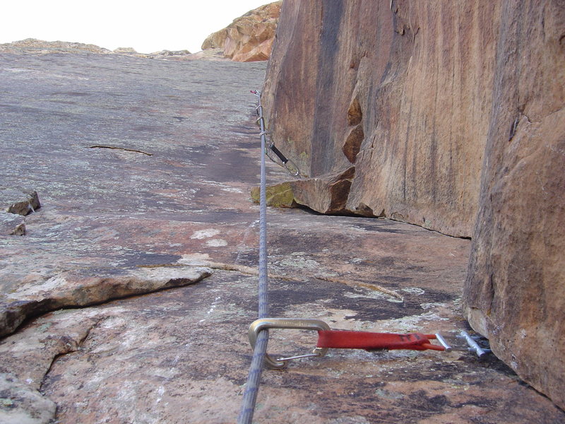 Sewing up the upper pitches. Takes good gear in addition to the bolts.