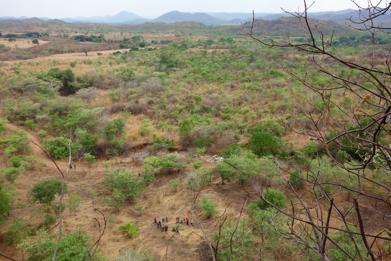 Locals cheering Pete during the first-ever climb at Macheni (& the view from the top).
