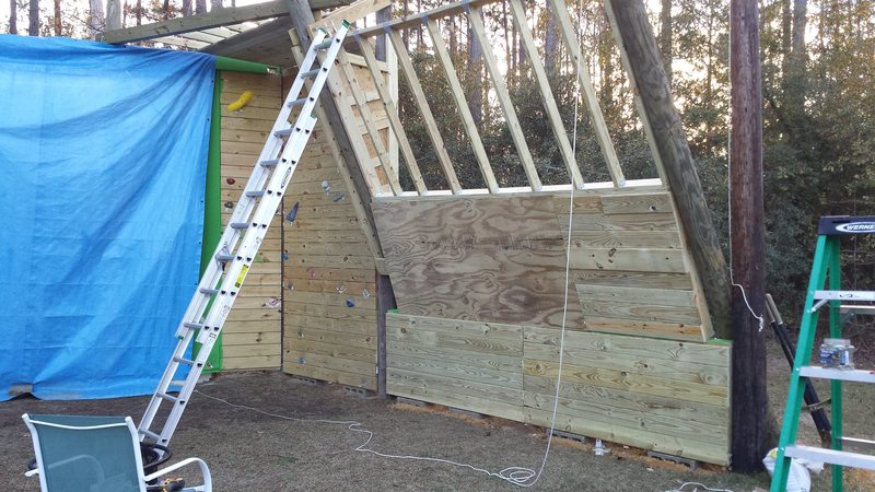 Section 2 covered. Combination of one sheet of plywood, leftover deckboards and 2x6's. Don't be afraid to use your scrap wood as long as its pressure treated.