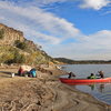 Snake River Access landing at the put out below the Owl Cove.  Main Wall visible in the background.  Chris Barnes, Andrew Thaler, and Nick Vitale. (Oct 2014)