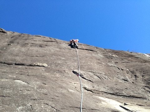 moving above the crux on the first ascent.