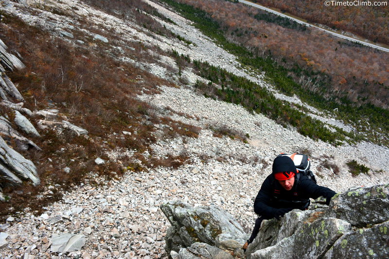 Matt Bacalakis climbing up Whitney Gilman Ridge<br>