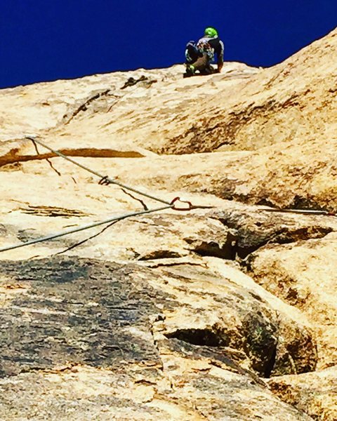 Heading up the steep crack section to the gear belay just below the Dappled Mare crossover--ignoring the tempting but inadvisable retro-anchor at the midpoint of the pitch.