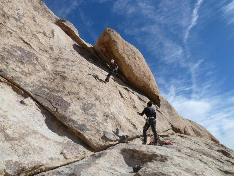 Lowering off the draws after leading, great warm up route for the 5.10's near by.