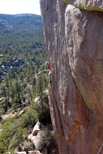 Joe Garcia on the pedestal above the thin crack. The wide crack is visible below him.