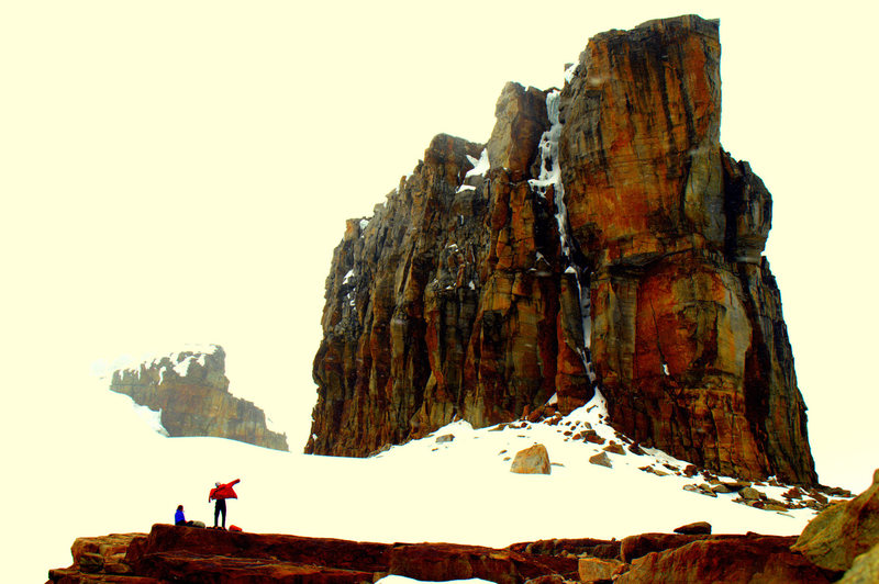 the "normal" route goes up a middle crack/dihedral section with a triangular snow/ice section at the very top above a ledge. Great friction, fun climbing, all around amazing fun. We did some funky delicate arm barring and fist jamming behind the ice to hump our way up to the final moves to achieve the top out