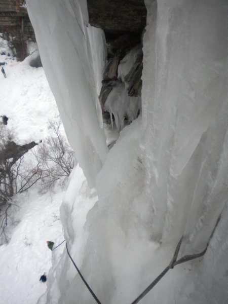 A girth-hitched ice column (I was long out of screws and desperate people!) and the belayer as a speck below