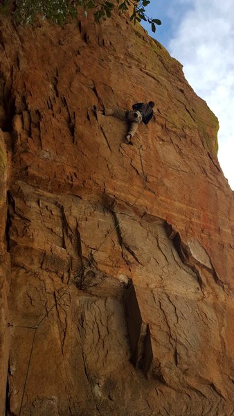 Jesse Schultz savors a rest prior to the crux.