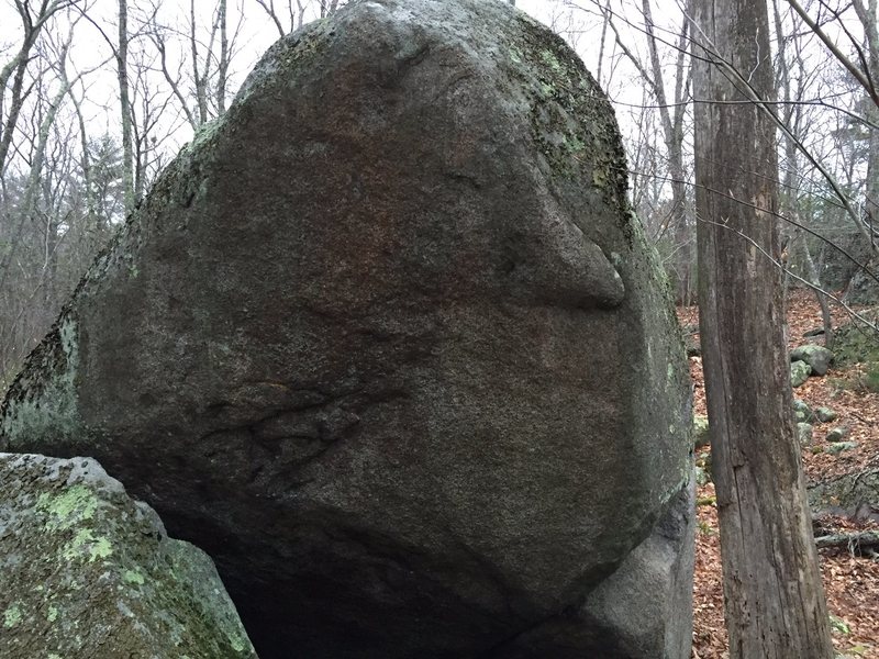 The Sickle, V11. <br>
<br>
Start in the obvious feature down low on right corner, and move up the obvious flake, then exit out right.