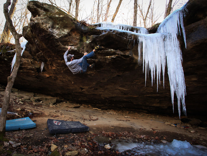 "The Nemesis" FA - v9 - This one starts at the golden utter about 35+ feet back in the cave and tops out on the head to my left. Classic.